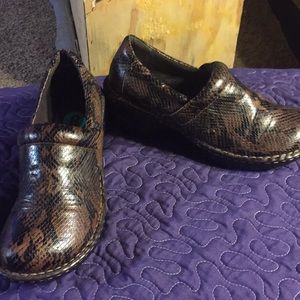 BOC snakeskin women’s clogs.